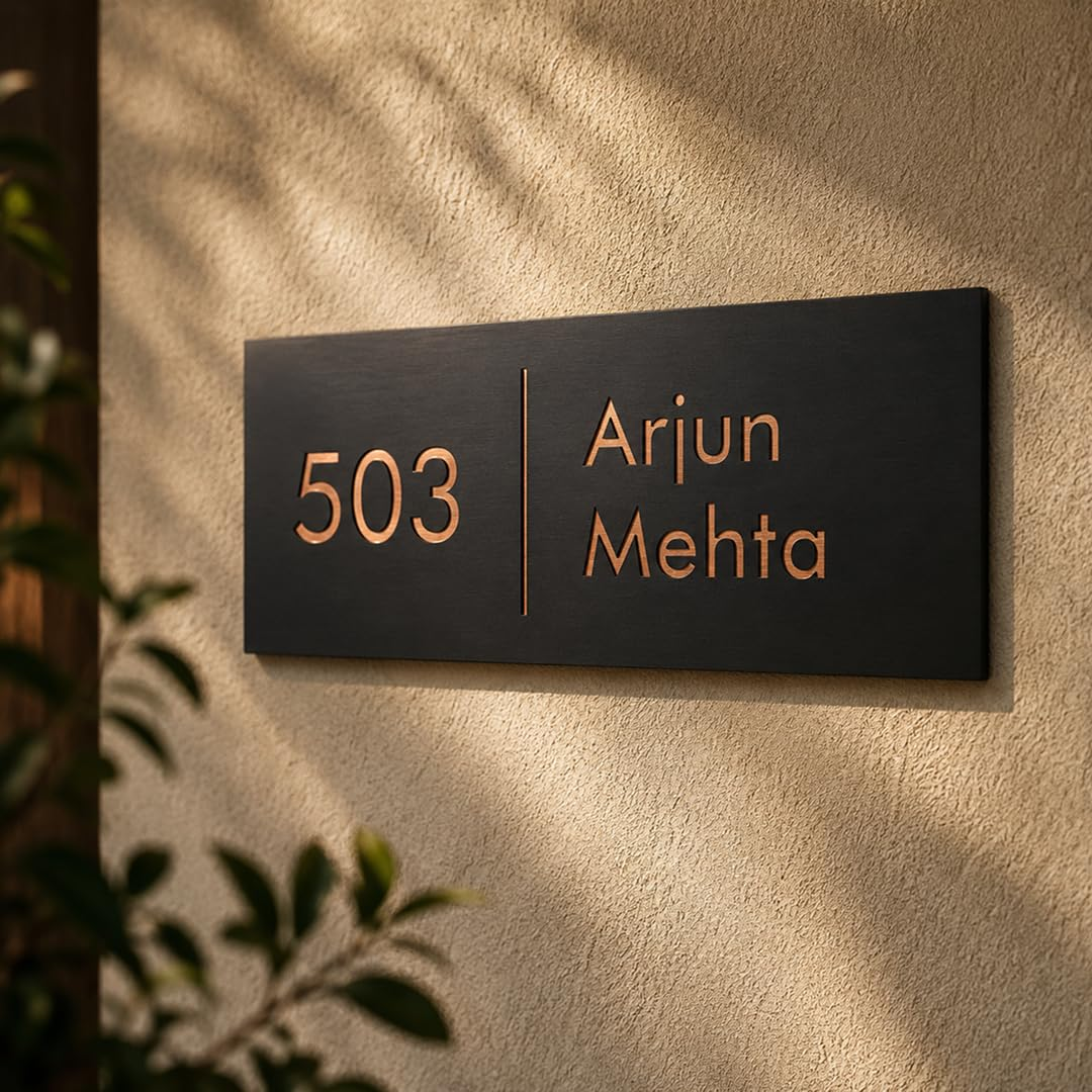 Matte black charcoal-style nameplate with raised lettering