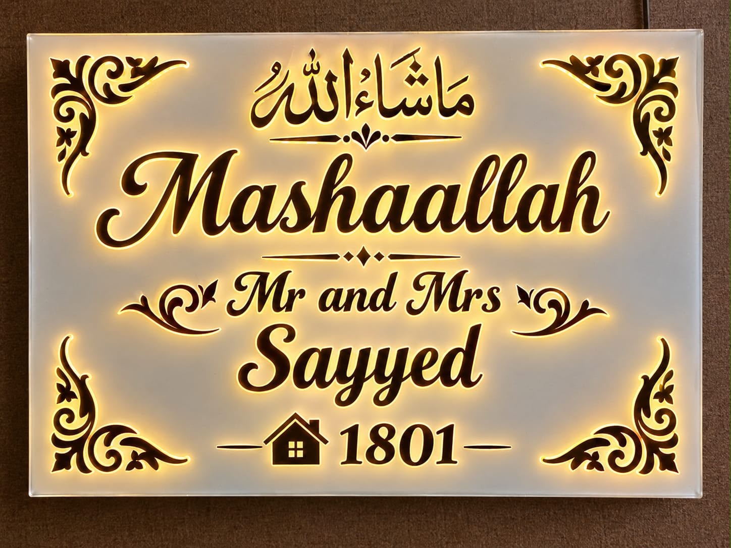 Original photograph of a rectangular LED acrylic nameplate