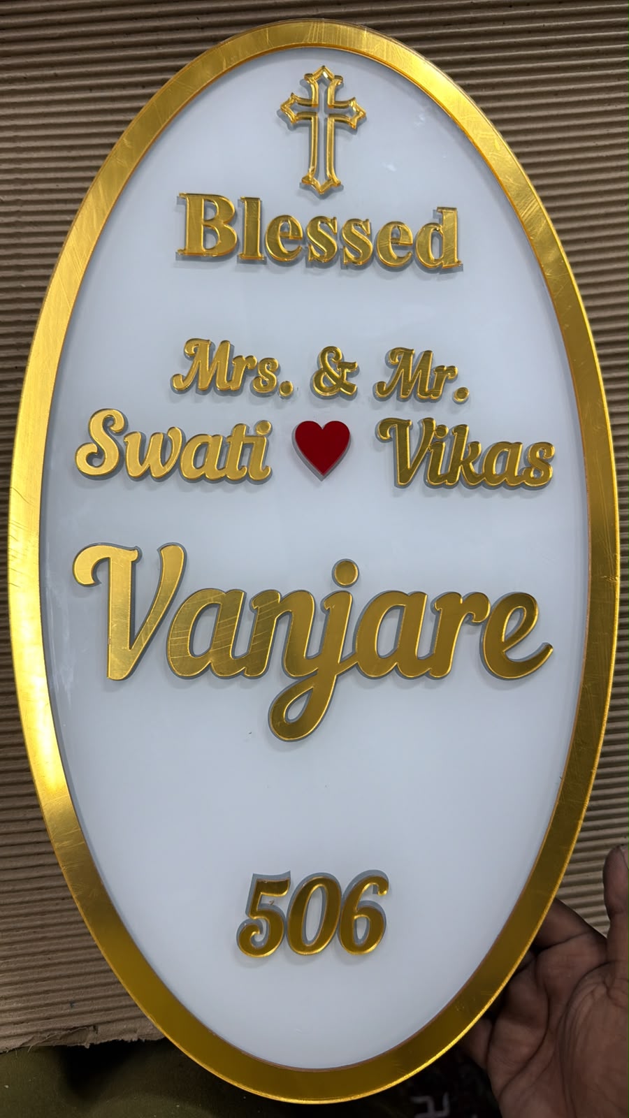 Original photograph of a premium round illuminated nameplate